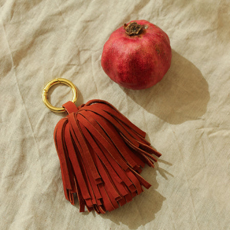 Upcycled Leather Pom Tassel Bag Charm - in Burnt Sienna Red